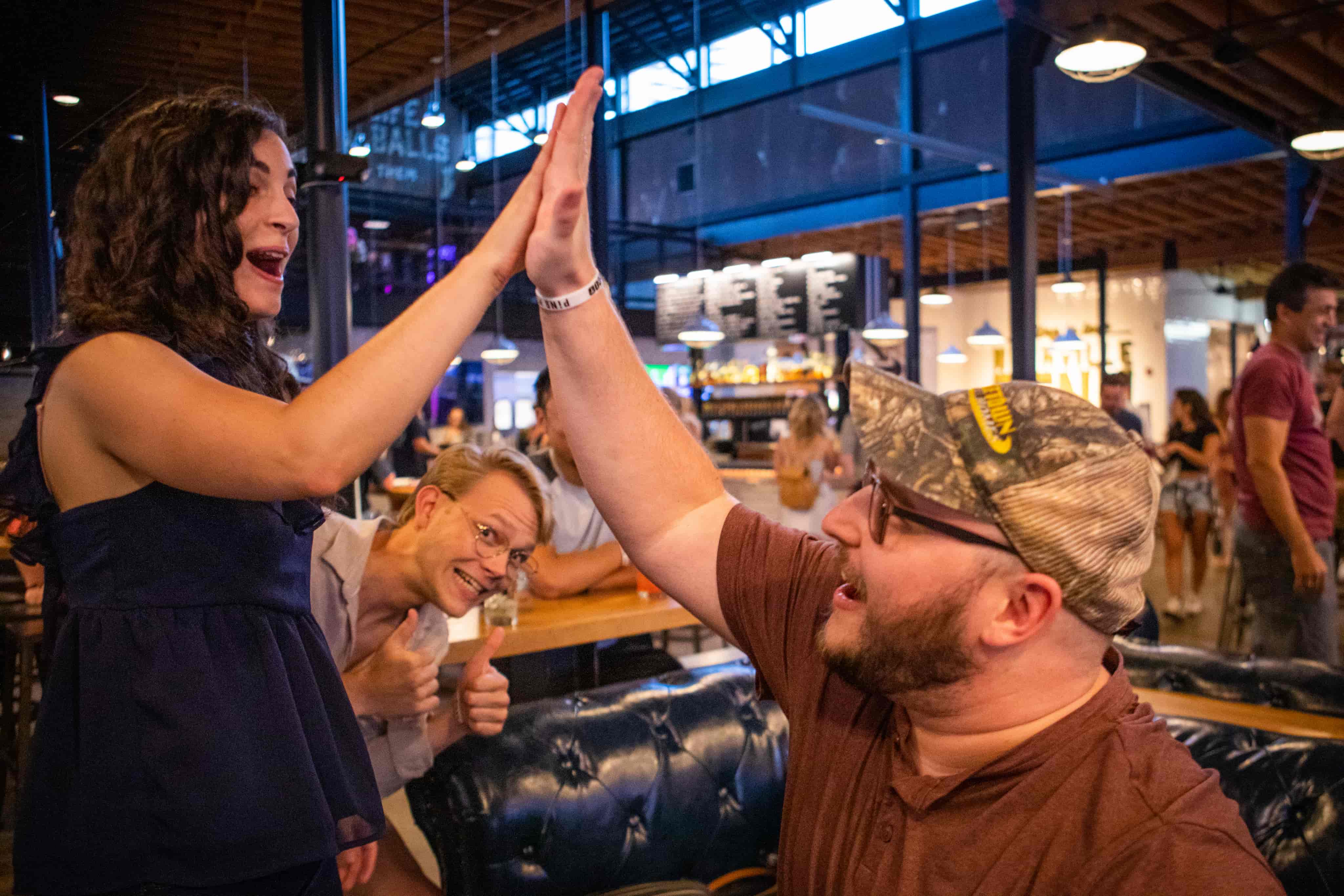 jared + tatiana high fiving